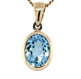 9Ct Yellow Gold Oval Blue Topaz Pendsnt